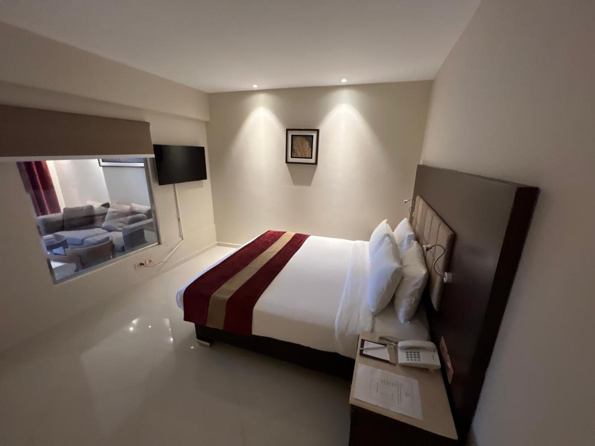 Hotel Grand Ocean El Sokhna Ain Suchna Exterior foto A bedroom at the hotel