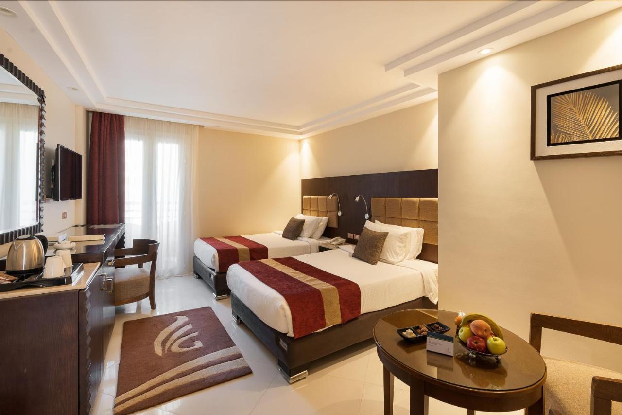 Hotel Grand Ocean El Sokhna Ain Suchna Exterior foto A room at the hotel